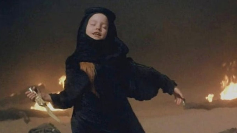 Alia holding a knife in "Dune" (1984)