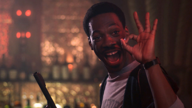 Axel Foley displaying an A-OK sign in "Beverly Hills Cop" (1984)