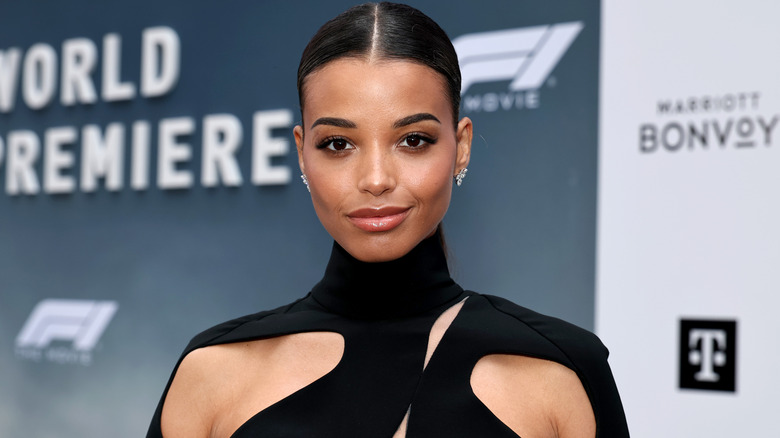 Ella Balinska smiling at the "F1: The Movie" premiere in New York in 2025 and fan art of Rhiannon.