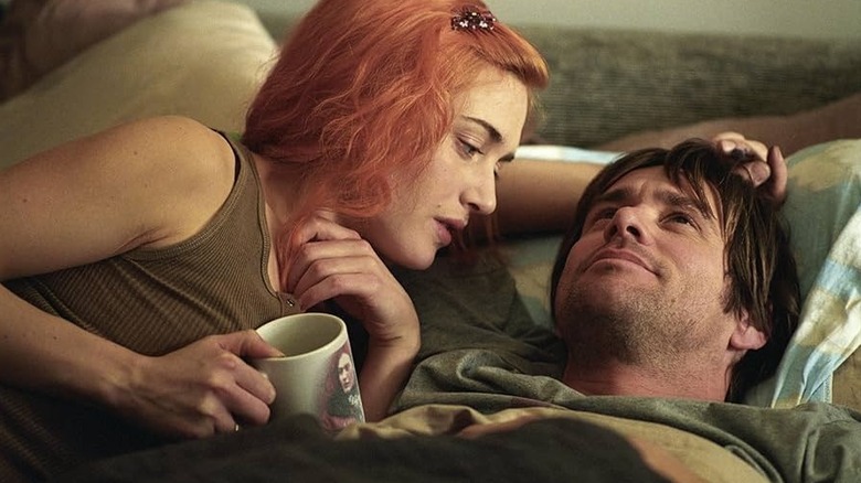 Joel and Clementine lie on the pull-out bed together in "Eternal Sunshine of the Spotless Mind" (2004)