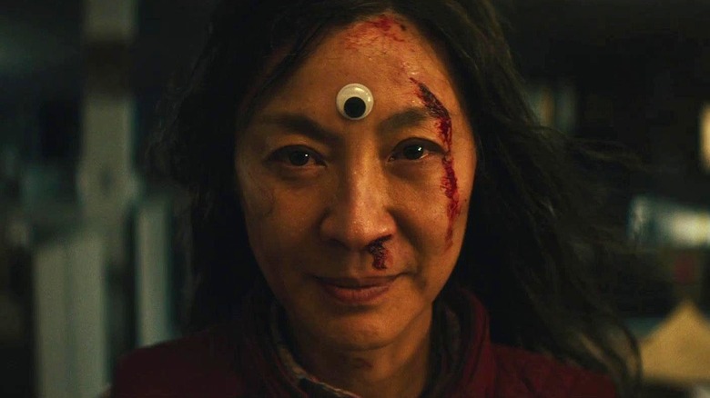 Evelyn with a googly eye on her forehead in Everything Everywhere All At Once (2022)