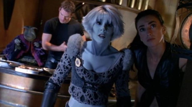 Chiana and Aeryn look out a window in "Farscape" (1999-2003)