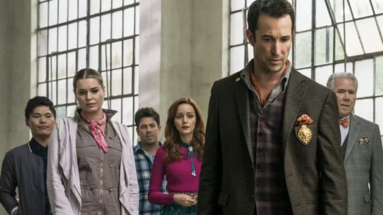 Flynn Carsen alongside his team in "The Librarians" (2014-2018)
