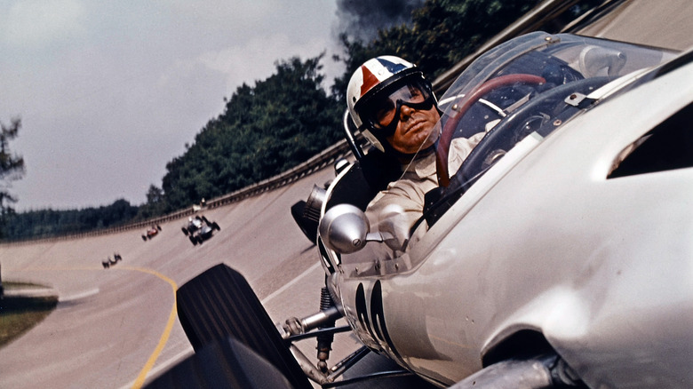 Pete Aron races a car in "Grand Prix" (1966)