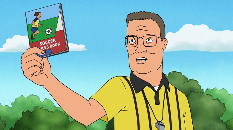 Hank brandishes a soccer handbook in "King of the Hill"