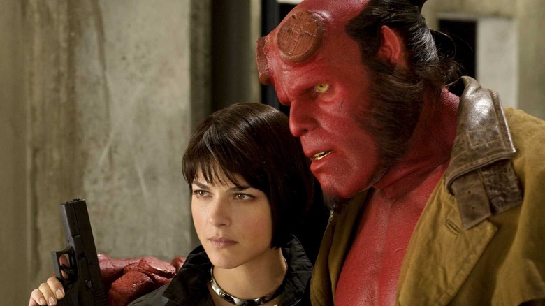Liz and Hellboy canoodle in "Hellboy II: The Golden Army" (2008)