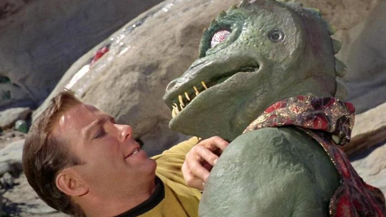 Kirk grapples with a Gorn in Star Trek