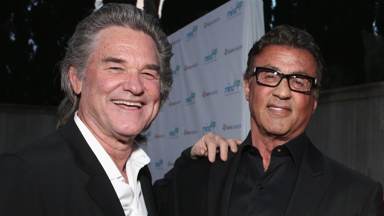 Kurt Russell and Sylvester Stallone smiling together at Goldie's Love In For Kids (2016)