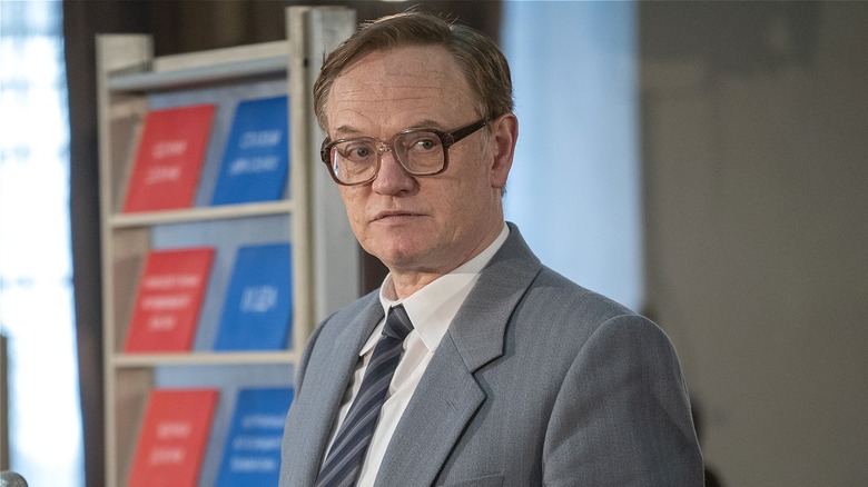Legasov standing at podium in Chernobyl