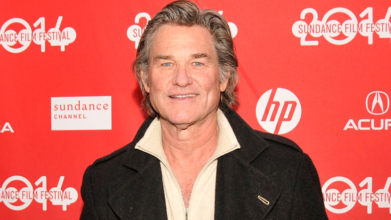 Kurt Russell smiling at "The Battered Bastards Of Baseball" premiere in 2014