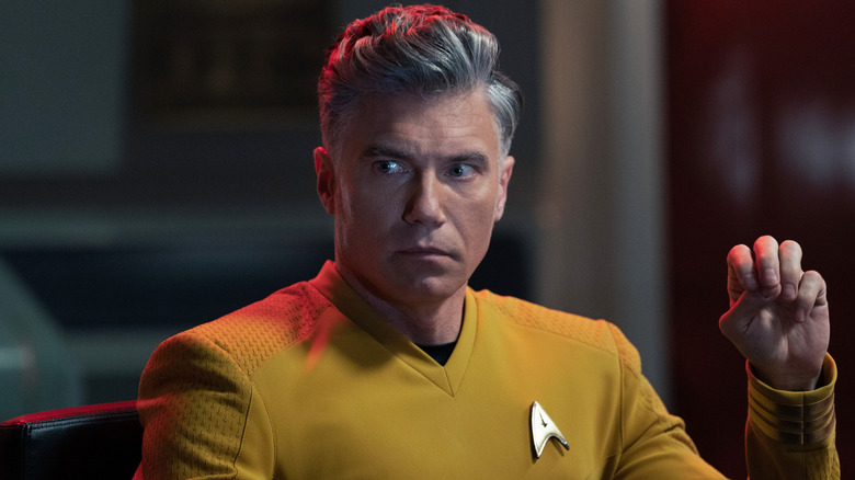 Captain Pike sits in the command chair in "Star Trek: Strange New Worlds" (2022-present)