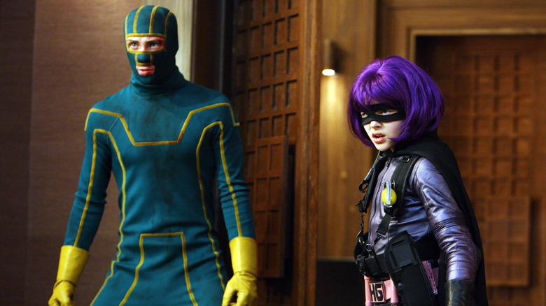 Kick-Ass and Hit Girl ready to fight the bad guys in Kick-Ass (2010)