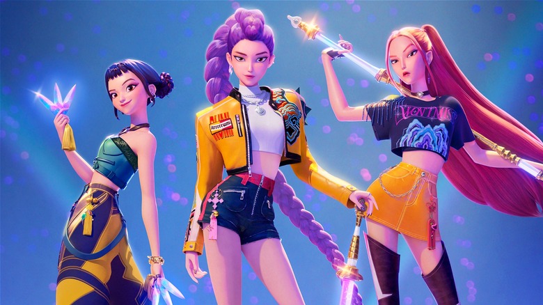 Mira, Rumi, and Zoey from "KPop Demon Hunters" posing with weapons