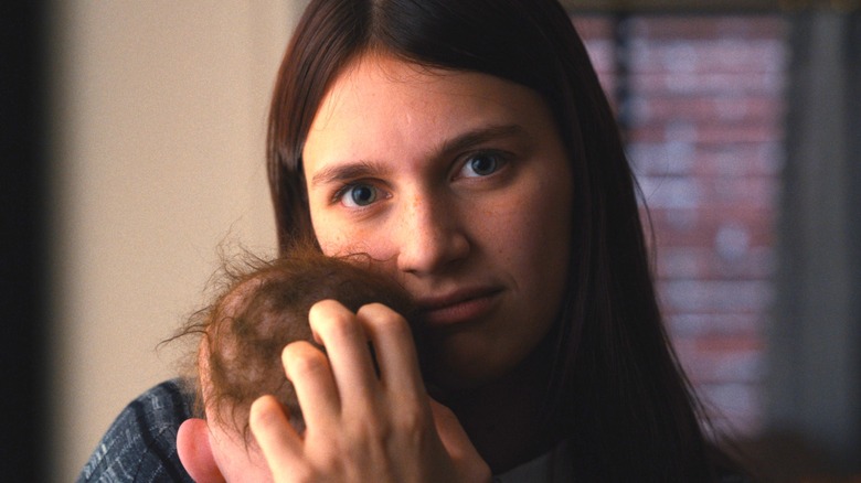 Leanne Grayson holds baby Jericho in "Servant" (2019 - 2023)