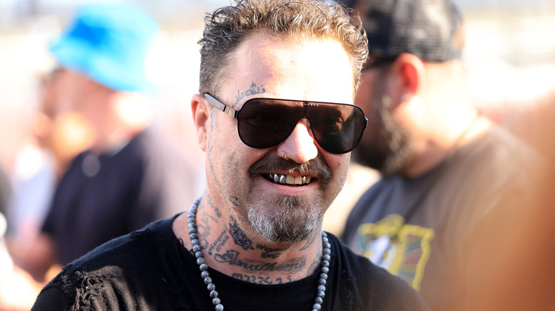 Bam Margera smiling and wearing sunglasses