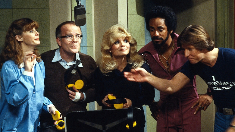 Andy, Arthur, Jennifer, Venus, and Bailey standing in the studio (1982)