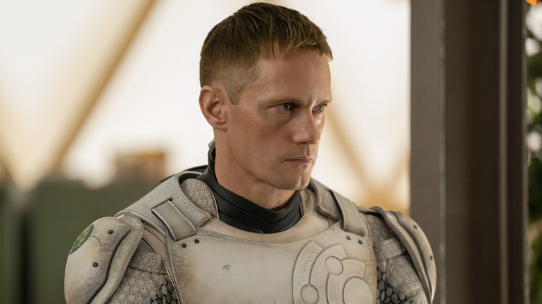 Murderbot looking to the side in "Murderbot" (2025)