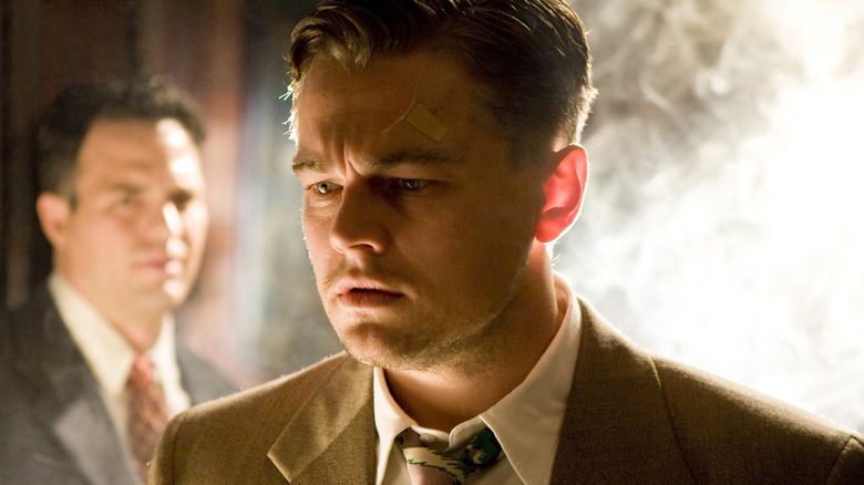 Teddy Daniels looks confused in "Shutter Island" (2010)