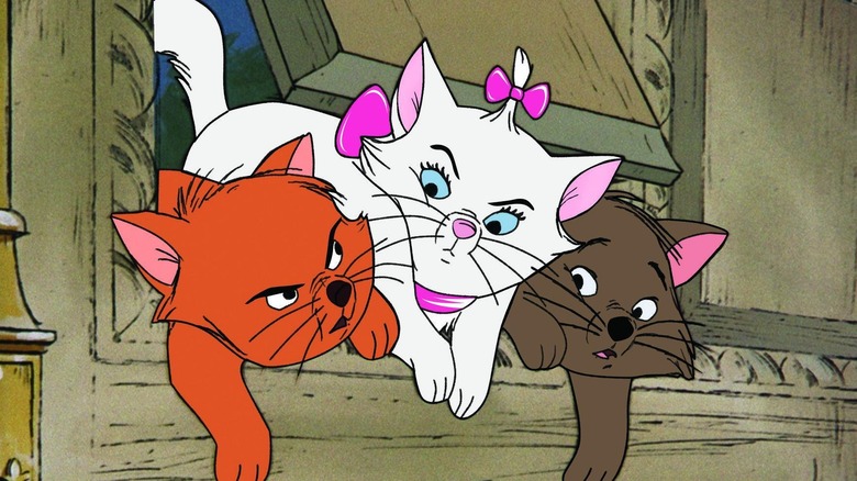 ﻿Berlioz, Marie, and Toulouse squeeze through a hole in "The Aristocats" (1970)