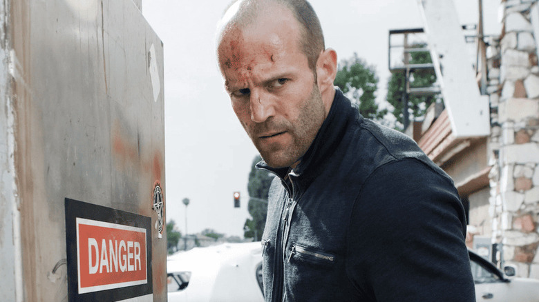 Chev stands by an electrical box in "Crank" (2006)