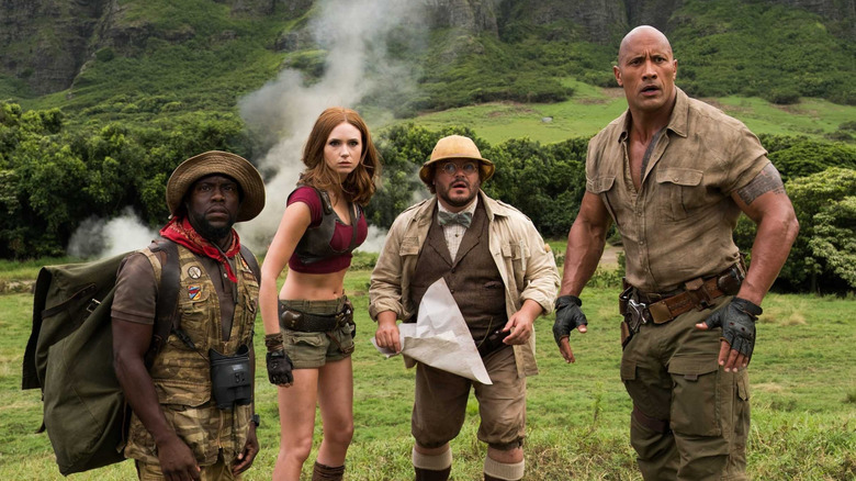The four avatars looking shocked in the game in Jumanji: Welcome to the Jungle (2017)