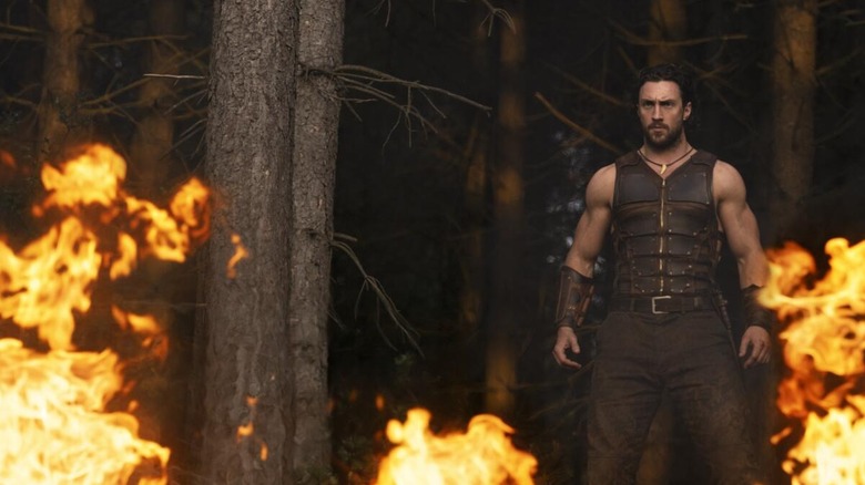 Kraven stands in the fire in "Kraven the Hunter" (2025)