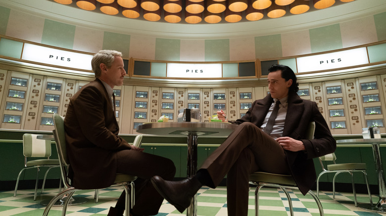 Mosby (Owen Wilson) and Loki (Tom Hiddleston) taking a break to chat and eat some pie in the TVA cafeteria