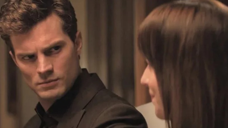 Christian looking at Ana in Fifty Shades of Grey (2015)