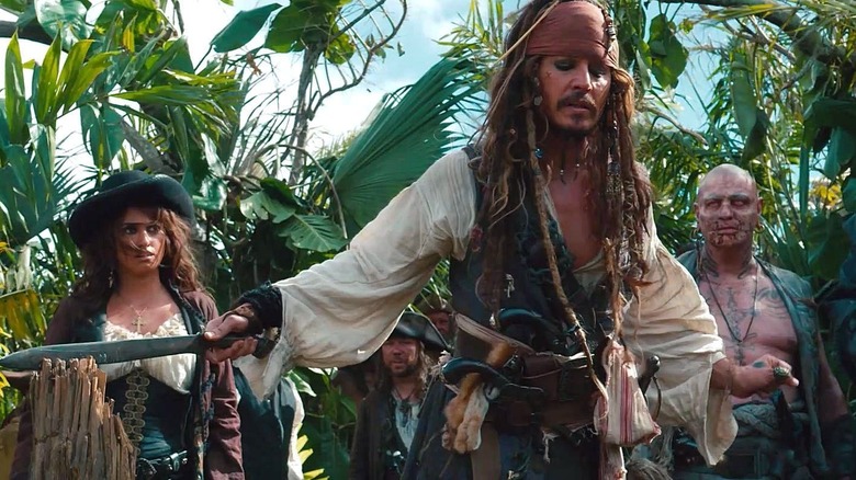 Jack Sparrow cuts his way through a jungle in "Pirates of the Caribbean: On Stranger Tides" (2011)