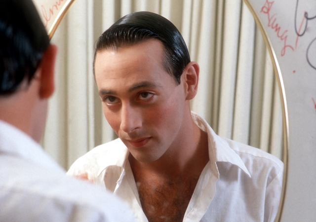 LOS ANGELES - MAY 1980: Actor Paul Reubens transforms himself in the mirror into his character Pee-wee Herman in May 1980 in Los Angeles, California. (Photo by Michael Ochs Archives/Getty Images)