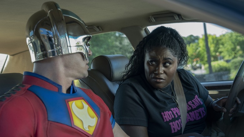 Leota and Peacemaker in a car in "Peacemaker"