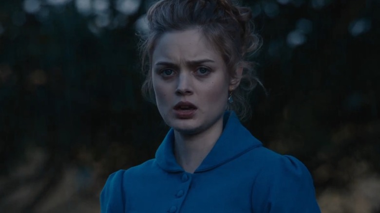 Elizabeth wearing blue coat in Pride, Prejudice, and Zombies (2016)