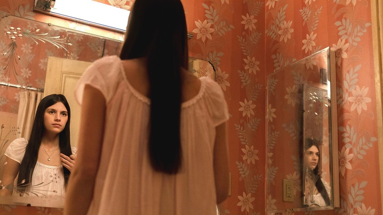 Leanne Grayson stares in the mirror in "Servant" (2019-2023)
