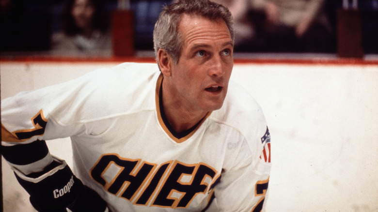 Reggie in a Chiefs jersey looking up in "Slap Shot" (1977)