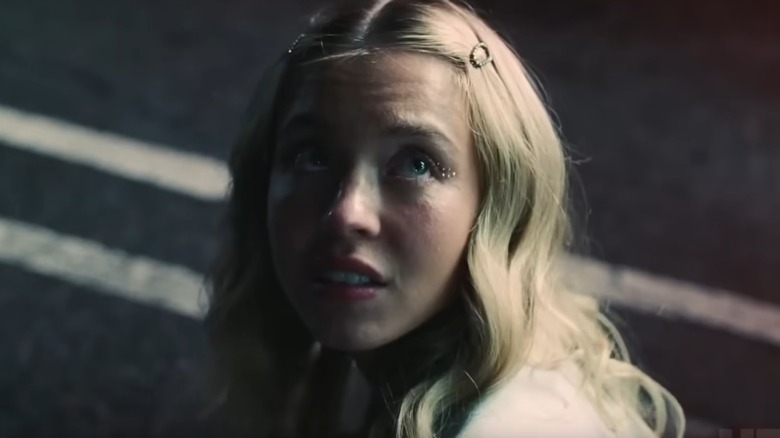 Cassie looking up and over her shoulder in "Euphoria" (2019-present)