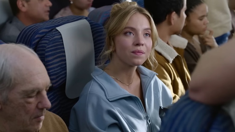 Bea sitting on airplane in "Anyone But You" (2023)