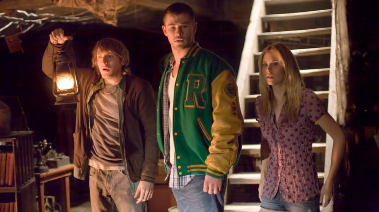 Marty, Curt and Jules enter the basement in "The Cabin in the Woods"