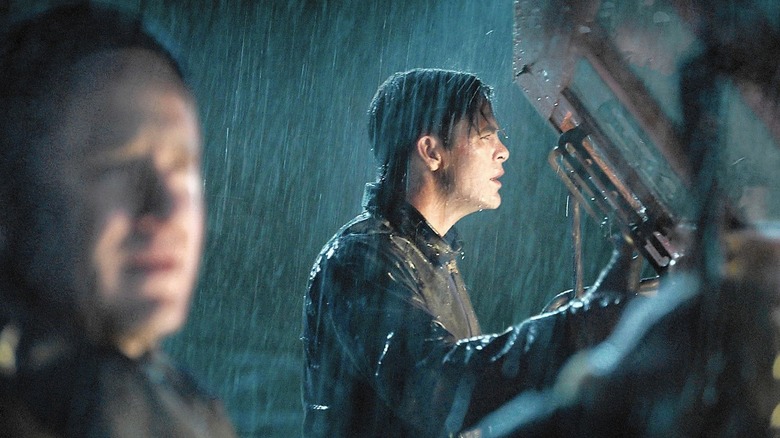 Bernie steers a boat in the rain in "The Finest Hours" (2016)