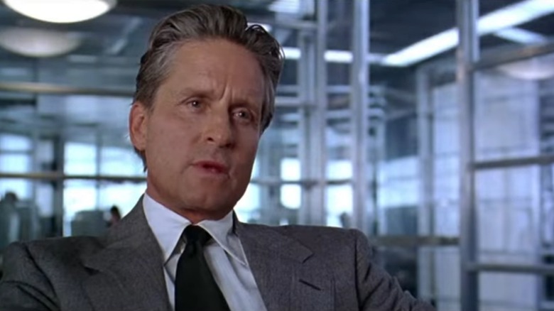 Nicholas sitting in an office in "The Game" (1997)