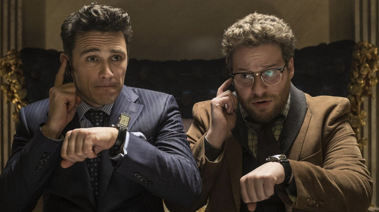 Dave and Aaron synchronizing watches in The Interview