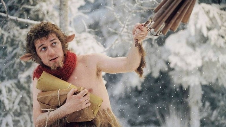 A close up of Tumnus (James McAvoy) holding his umbrella in the snow in "The Lion, the Witch and the Wardrobe" (2005)