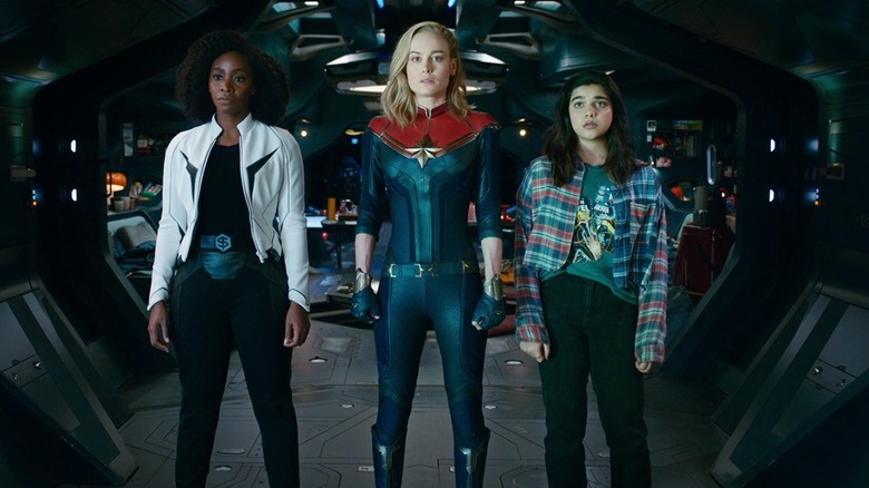 Monica Rambeau, Captain Marvel, and Ms. Marvel stand together in "The Marvels" (2023)