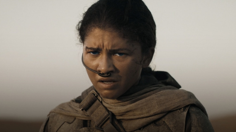 Chani on the sand in a stillsuit in "Dune: Part Two" (2024)