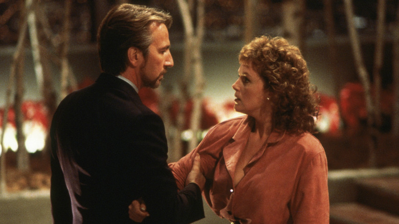 Gruber holds Holly hostage in "Die Hard" (1988)