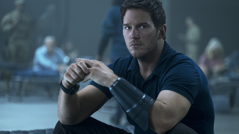 Dan sitting down in "The Tomorrow War" (2021)