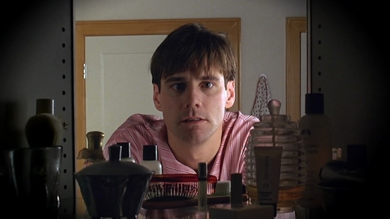 Truman viewed from inside a cabinet in "The Truman Show" (1998)