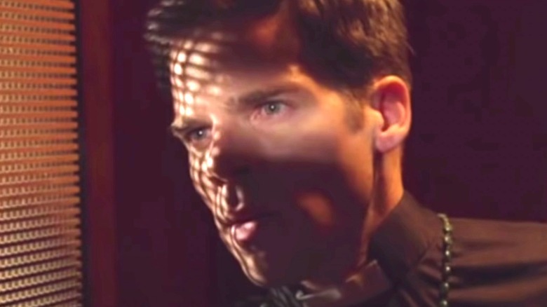 Doug Jones listening to a confession in The VelociPastor (2017)