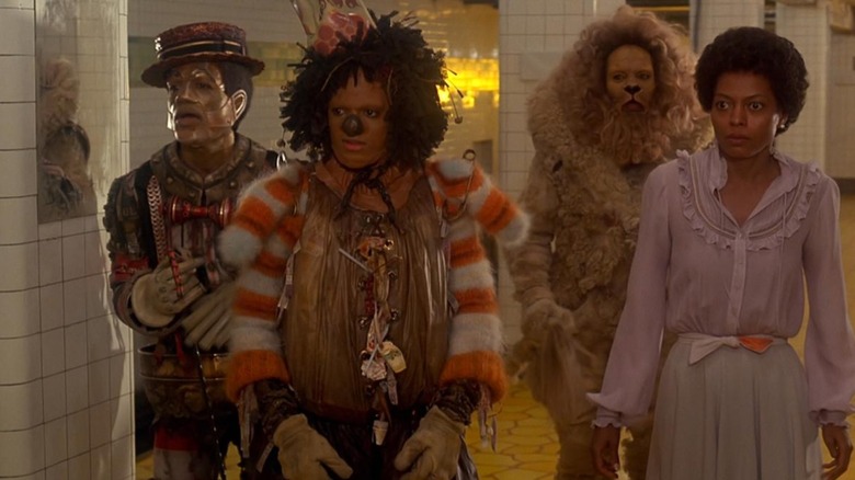 The Tin Man, Lion, Scarecrow, and Dorothy stand together in "The Wiz" (1978)