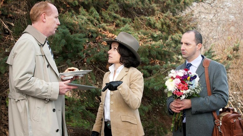 Press secretary Mike McLintock (Matt Walsh) giving bad news to Vice President Selina Meyer (Julia Louis-Dreyfus) while her bag-man, Gary (Tony Hale) stands by on "Veep"