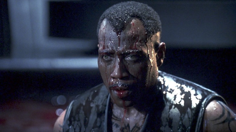 Blade is dripping with blood in "Blade" (1998)